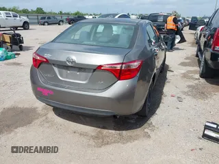 2018 Toyota Corolla L z VIN 5YFBURHE1JP855556, wystawiony jako IAAI lot #42273685 z przebiegiem 165 792 mil mil oraz . Historia ofert i sprzedaży dostępna na DreamBid. Obrazek 4.