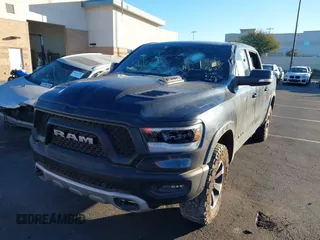 2019 Ram 1500 Rebel z VIN 1C6SRFLT2KN900600, wystawiony jako IAAI lot #41307832 z przebiegiem 74 481 mil mil oraz . Historia ofert i sprzedaży dostępna na DreamBid. Obrazek 20.