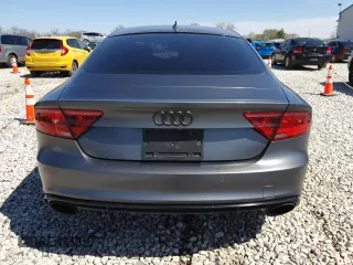 2015 Audi RS 7 Prestige z VIN WUAW2AFC8FN900610, wystawiony jako Copart lot #50708225 z przebiegiem 103 811 mil mil oraz Szkody całkowita. Historia ofert i sprzedaży dostępna na DreamBid. Obrazek 6.