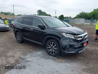 2019 Honda Pilot Touring 8-Passenger with VIN 5FNYF6H93KB013191, listed as a IAAI auction lot 42762827 with 41,975 mi miles and . Bid and sale history available at DreamBid. Image 1.