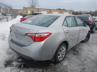 2016 Toyota Corolla L with VIN 2T1BURHE6GC643373, listed as a IAAI auction lot 41641399 with 85,088 mi miles and . Bid and sale history available at DreamBid. Image 4.