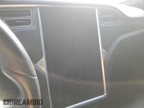 2017 Tesla Model S 100D z VIN 5YJSA1E27HF206144, wystawiony jako Copart lot #87453654 z przebiegiem Nie podano mil oraz Szkoda całkowita • Salvage title. Historia ofert i sprzedaży dostępna na DreamBid. Obrazek 9.