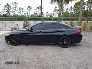 2015 BMW 4 Series 435i with VIN WBA4B1C5XFD955119, listed as a IAAI auction lot 41349918 with 181,937 mi miles and . Bid and sale history available at carsss.com. Image 15.
