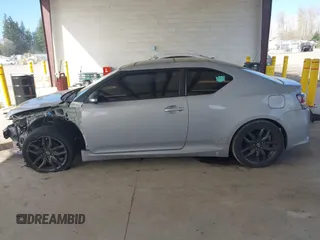 2014 Scion tC with VIN JTKJF5C71E3069593, listed as a IAAI auction lot 41901040 with 86,231 mi miles. Bid and sale history available at carsss.com. Image 14.