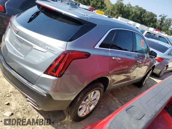 2023 Cadillac XT5 FWD Luxury z VIN 1GYKNAR4XPZ144533, wystawiony jako Copart lot #74734164 z przebiegiem Nie podano mil oraz Nie do naprawy • Non repairable. Historia ofert i sprzedaży dostępna na DreamBid. Obrazek 3.
