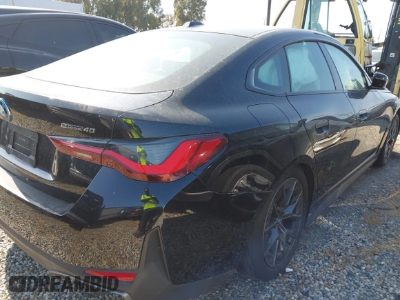 2023 BMW i4 eDrive40 z VIN WBY73AW03PFR16924, wystawiony jako IAAI lot #42034635 z przebiegiem 15 136 mil mil oraz . Historia ofert i sprzedaży dostępna na DreamBid. Obrazek 4.