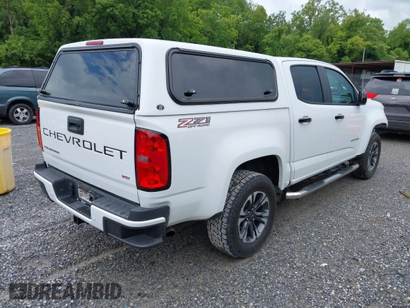 2021 Chevrolet Colorado 4WD Z71 with VIN 1GCGTDEN3M1122062, listed as a IAAI auction lot 42687632 with 52,233 mi miles and . Bid and sale history available at DreamBid. Image 4.