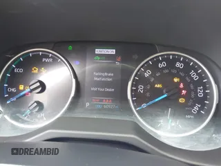 2020 Toyota RAV4 Hybrid XLE with VIN 2T3RWRFV5LW094731, listed as a IAAI auction lot 42349123 with 60,927 mi miles and . Bid and sale history available at DreamBid. Image 7.