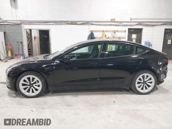 2023 Tesla Model 3 with VIN 5YJ3E1EA5PF552241, listed as a IAAI auction lot 41876487 with 18,533 mi miles and . Bid and sale history available at carsss.com. Image 14.