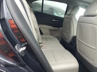 2022 Cadillac XT4 FWD Premium Luxury z VIN 1GYFZCR44NF166169, wystawiony jako Copart lot #77981414 z przebiegiem 9 734 mil mil oraz Nie do naprawy • Non repairable. Historia ofert i sprzedaży dostępna na DreamBid. Obrazek 11.