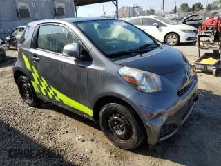 2014 Scion iQ with VIN JTNJJXB0XEJ029610, listed as a Copart auction lot 46700905 with 135,381 mi miles and Salvage Title. Bid and sale history available at carsss.com. Image 4.