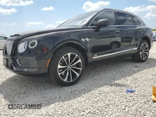 2017 Bentley Bentayga W12 z VIN SJAAC2ZV5HC013960, wystawiony jako Copart lot #53608545 z przebiegiem 34 698 mil mil oraz Szkody całkowita. Historia ofert i sprzedaży dostępna na DreamBid. Obrazek 1.