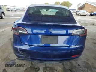 2020 Tesla Model 3 Standard Range Plus with VIN 5YJ3E1EA1LF631139, listed as a Copart auction lot 49161805 with 58,140 mi miles and Salvage Title. Bid and sale history available at DreamBid. Image 6.