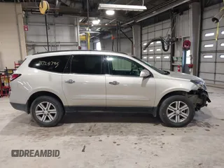 2015 Chevrolet Traverse LT with VIN 1GNKRHKDXFJ194964, listed as a IAAI auction lot 41728795 with 167,760 mi miles and . Bid and sale history available at DreamBid. Image 14.