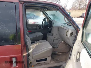 1999 Chevrolet Astro with VIN 1GNEL19W5XB102247, listed as a IAAI auction lot 41598483 with 184,041 mi miles. Bid and sale history available at carsss.com. Image 5.