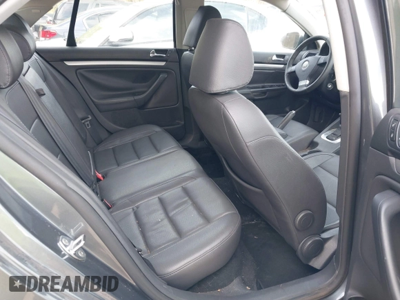 2009 Volkswagen Jetta Wolfsburg Edition with VIN 3VWRJ71K99M023071, listed as a IAAI auction lot 41853293 with 121,311 mi miles and . Bid and sale history available at DreamBid. Image 8.