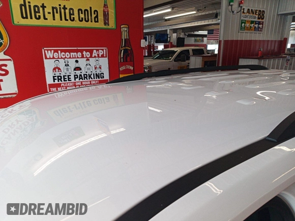 2022 Chevrolet Traverse LT with VIN 1GNEVHKW7NJ155600, listed as a IAAI auction lot 42793694 with 78,927 mi miles and . Bid and sale history available at DreamBid. Image 26.