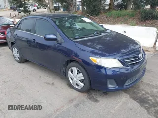 2013 Toyota Corolla L with VIN 5YFBU4EE5DP095580, listed as a IAAI auction lot 42147355 with 180,447 mi miles. Bid and sale history available at carsss.com. Image 1.