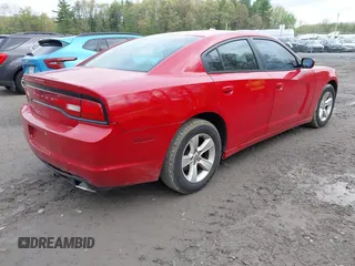 2014 Dodge Charger SE with VIN 2C3CDXBG6EH172058, listed as a IAAI auction lot 42227390 with 174,148 mi miles and . Bid and sale history available at carsss.com. Image 4.