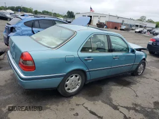 1994 Mercedes-Benz C 230/260/280/320 with VIN WDBHA28E8RF098148, listed as a Copart auction lot 60884345 with 238,600 mi miles and Salvage title. Bid and sale history available at DreamBid. Image 3.