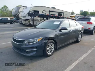 2016 Kia Optima LX with VIN KNAGT4L33G5107444, listed as a IAAI auction lot 41971006 with 174,997 mi miles. Bid and sale history available at carsss.com. Image 18.