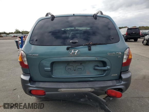2003 Hyundai Santa Fe GLS with VIN KM8SC73D03U421863, listed as a Copart auction lot 71573724 with 184,028 mi miles and Salvage Title. Bid and sale history available at carsss.com. Image 6.