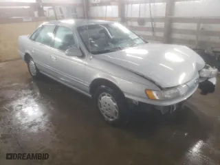 1994 Ford Taurus GL with VIN 1FALP52U5RG255078, listed as a Copart auction lot 86631304 with 86,662 mi miles and Salvage Title. Bid and sale history available at carsss.com. Image 4.