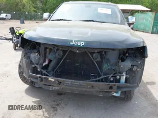 2014 Jeep Grand Cherokee Limited with VIN 1C4RJFBG3EC497939, listed as a IAAI auction lot 42127152 with 112,095 mi miles and . Bid and sale history available at DreamBid. Image 6.