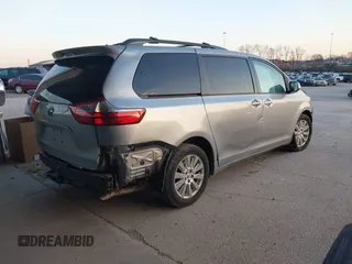 2016 Toyota Sienna LE with VIN 5TDJK3DC4GS133694, listed as a IAAI auction lot 41171171 with 99,680 mi miles. Bid and sale history available at carsss.com. Image 4.