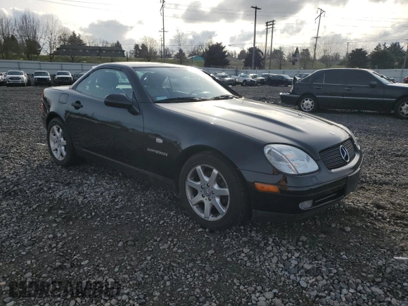 1999 Mercedes-Benz SLK 230/320 z VIN WDBKK47F7XF142078, wystawiony jako Copart lot #43598095 z przebiegiem 61 995 mil mil oraz Szkoda całkowita • Salvage title. Historia ofert i sprzedaży dostępna na DreamBid. Obrazek 4.