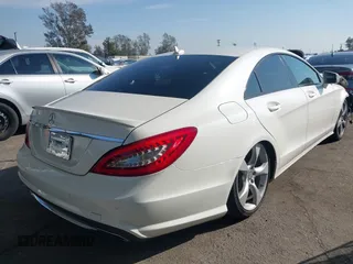 2014 Mercedes-Benz CLS-Class CLS 550 with VIN WDDLJ7DB9EA108235, listed as a IAAI auction lot 41425861 with 94,073 mi miles. Bid and sale history available at carsss.com. Image 4.