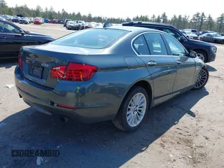 2011 BMW 5 Series 535i xDrive with VIN WBAFU7C56BC771267, listed as a IAAI auction lot 42006086 with 123,249 mi miles. Bid and sale history available at carsss.com. Image 4.