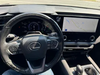 2023 Lexus RX 350h with VIN 2T2BBMCA7PC002273, listed as a Copart auction lot 66578935 with 105,321 mi miles and Clean title. Bid and sale history available at DreamBid. Image 7.
