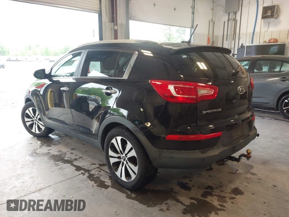 2012 Kia Sportage EX with VIN KNDPCCA2XC7311504, listed as a IAAI auction lot 42330710 with 170,638 mi miles and . Bid and sale history available at DreamBid. Image 3.