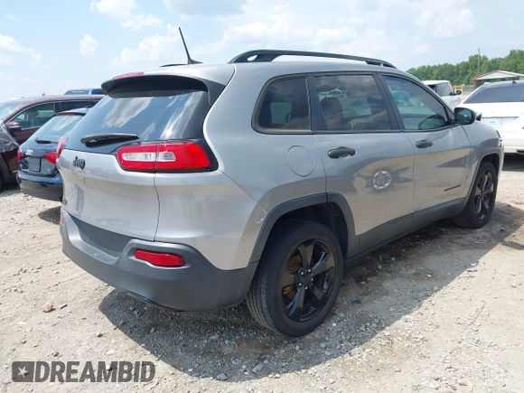 2016 Jeep Cherokee Altitude with VIN 1C4PJLAB7GW307900, listed as a IAAI auction lot 42611390 with 130,123 mi miles and . Bid and sale history available at DreamBid. Image 4.