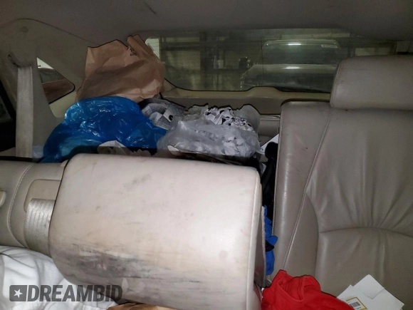 2006 Lexus RX 400h with VIN JTJHW31UX60022811, listed as a Copart auction lot 88362815 with 332,804 mi miles and Salvage Title. Bid and sale history available at DreamBid. Image 10.