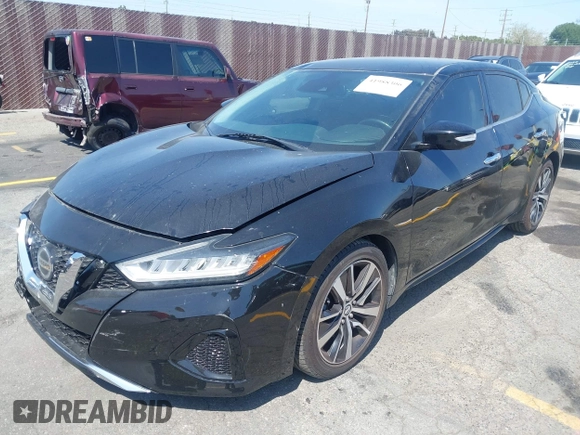 2020 Nissan Maxima SV with VIN 1N4AA6CV3LC363669, listed as a IAAI auction lot 41988306 with 87,766 mi miles and . Bid and sale history available at DreamBid. Image 2.
