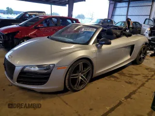 2011 Audi R8 z VIN WUAVNAFG2BN000687, wystawiony jako Copart lot #84693164 z przebiegiem 60 970 mil mil oraz Szkody całkowita. Historia ofert i sprzedaży dostępna na DreamBid. Obrazek 1.