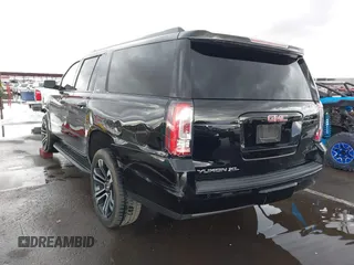 2019 GMC Yukon XL SLT with VIN 1GKS1GKC7KR155668, listed as a IAAI auction lot 41751792 with 163,537 mi miles. Bid and sale history available at carsss.com. Image 3.