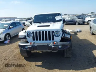 2023 Jeep Gladiator Mojave z VIN 1C6JJTEG7PL536582, wystawiony jako IAAI lot #42074073 z przebiegiem 34 262 mil mil oraz . Historia ofert i sprzedaży dostępna na DreamBid. Obrazek 13.