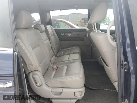 2014 Honda Odyssey EX-L with VIN 5FNRL5H63EB013483, listed as a Copart auction lot 63002435 with 127,059 mi miles and Salvage title. Bid and sale history available at DreamBid. Image 11.