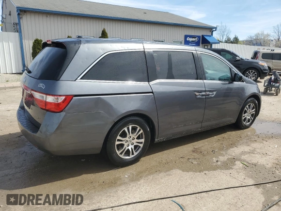 2012 Honda Odyssey EX-L with VIN 5FNRL5H61CB067331, listed as a Copart auction lot 50016455 with 156,020 mi miles and Non Repairable. Bid and sale history available at DreamBid. Image 3.