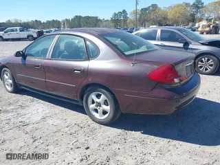 2001 Ford Taurus SES with VIN 1FAFP55U51G265509, listed as a IAAI auction lot 41886979 with 249,492 mi miles. Bid and sale history available at carsss.com. Image 3.