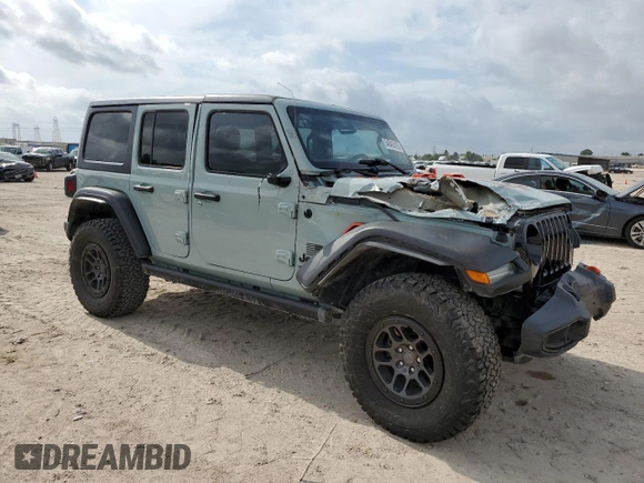 2023 Jeep Wrangler Willys with VIN 1C4HJXDN6PW664826, listed as a Copart auction lot 54842415 with 20,004 mi miles and Salvage Title. Bid and sale history available at DreamBid. Image 4.