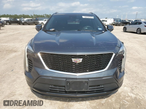 2020 Cadillac XT4 FWD Sport with VIN 1GYFZER40LF012664, listed as a Copart auction lot 54797915 with 59,393 mi miles and Salvage title. Bid and sale history available at DreamBid. Image 5.