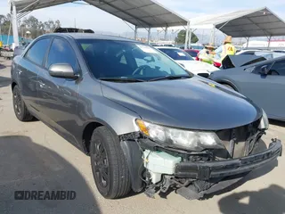 2013 Kia Forte EX with VIN KNAFU4A2XD5655018, listed as a IAAI auction lot 41756357 with 156,819 mi miles. Bid and sale history available at carsss.com. Image 1.
