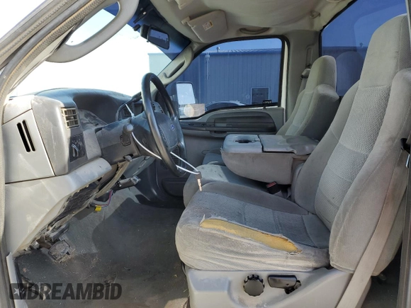 2004 Ford F-250 XL with VIN 1FTNF20L94EA54075, listed as a Copart auction lot 56751955 with 303,008 mi miles and Salvage title. Bid and sale history available at DreamBid. Image 7.
