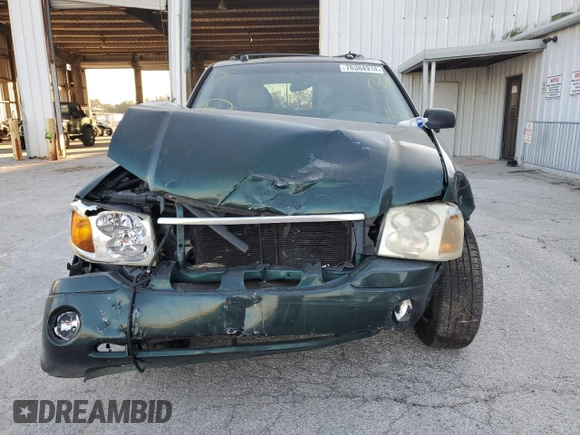 2005 GMC Envoy SLT with VIN 1GKDS13S652329610, listed as a Copart auction lot 76384914 with Not Provided miles and Salvage Title. Bid and sale history available at DreamBid. Image 5.
