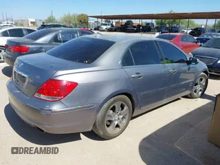 2005 Acura RL z VIN JH4KB16575C011822, wystawiony jako IAAI lot #42434095 z przebiegiem Nie podano mil oraz . Historia ofert i sprzedaży dostępna na DreamBid. Obrazek 4.