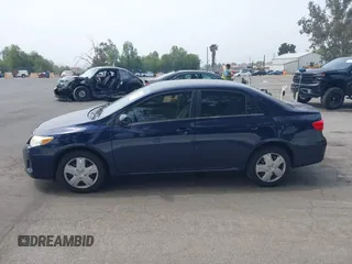 2013 Toyota Corolla L with VIN 5YFBU4EE5DP095580, listed as a IAAI auction lot 42147355 with 180,447 mi miles. Bid and sale history available at carsss.com. Image 14.
